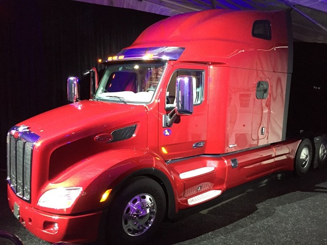 A Double Bunk Peterbilt Model 579 Ultraloft On Display At The Press