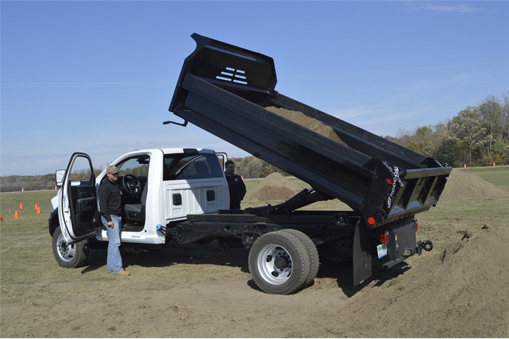 A 2016 Ram 5500 Chassis Regular Cab Tradesman 4X4 with dump bed upfit ...